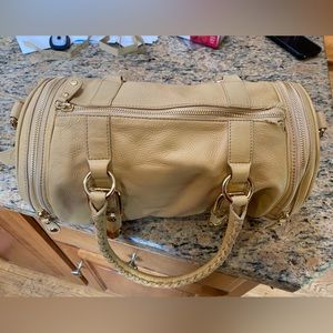 Cole Haan rounded purse.